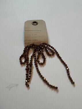 NEW Anthropologie brown beaded bow stud earrings